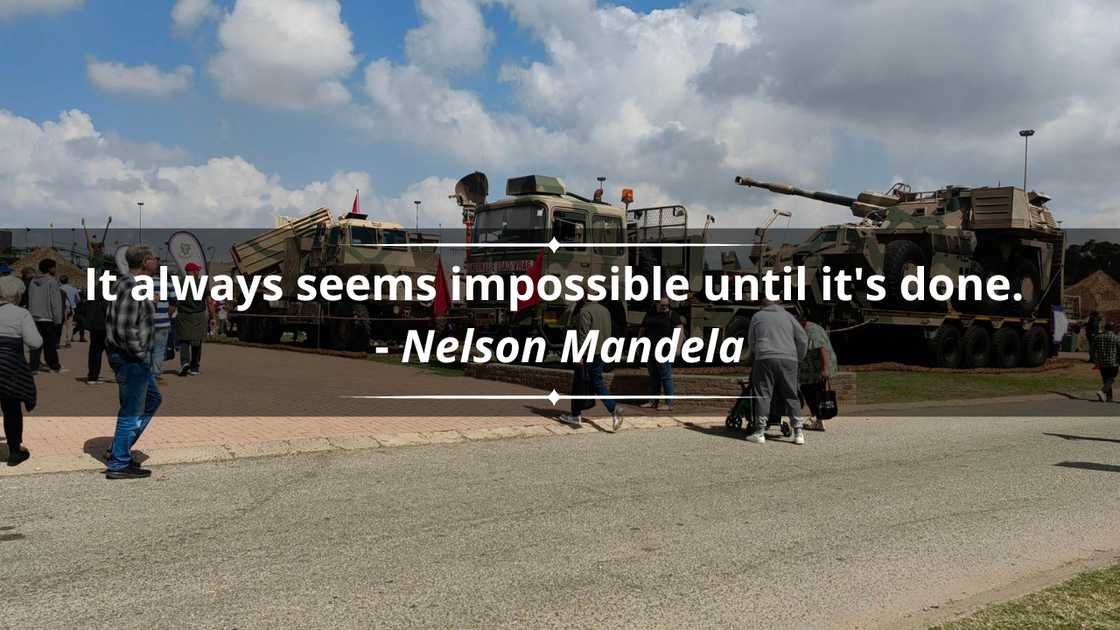 South African government officials inspecting military gear South African government officials inspecting military gear