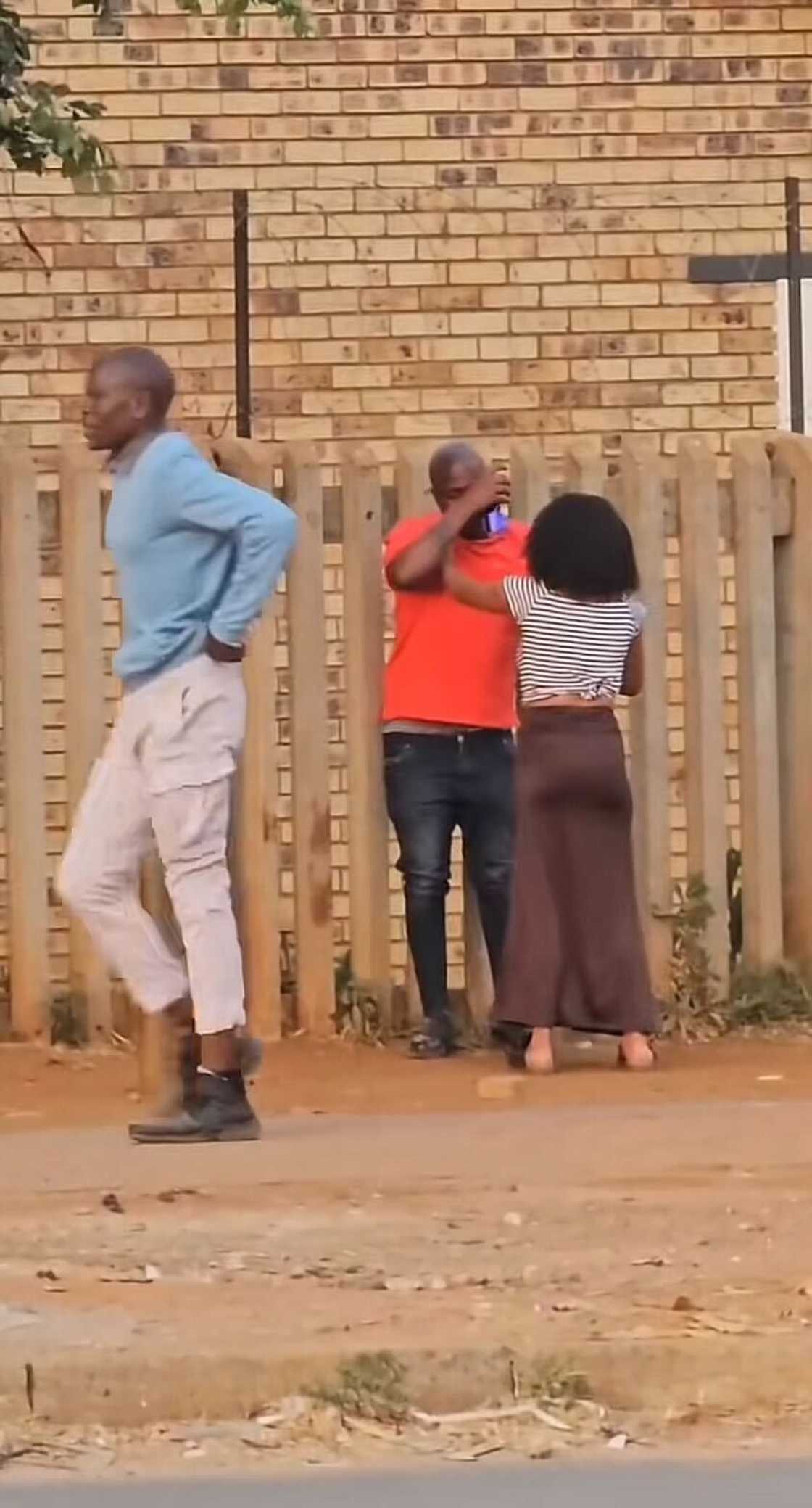 A woman's actions towards her man on the streets of South Africa ignited a fiery debate online.