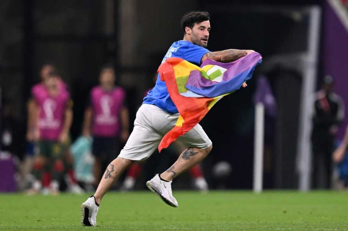 Mario Ferri, 35, who calls himself 'The Falcon', interrupted the Portugal-Uruguay game Mario Ferri, 35, who calls himself 'The Falcon', interrupted the Portugal-Uruguay game