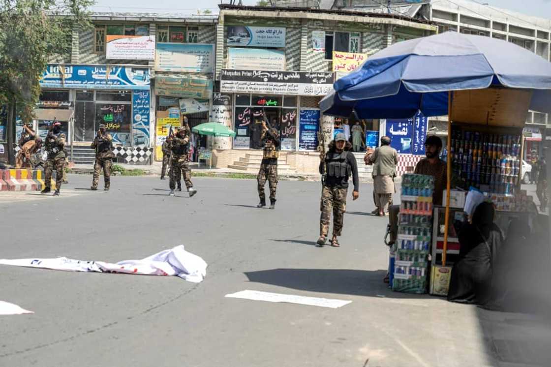 Taliban fighters disperse the protesters in Kabul Taliban fighters disperse the protesters in Kabul