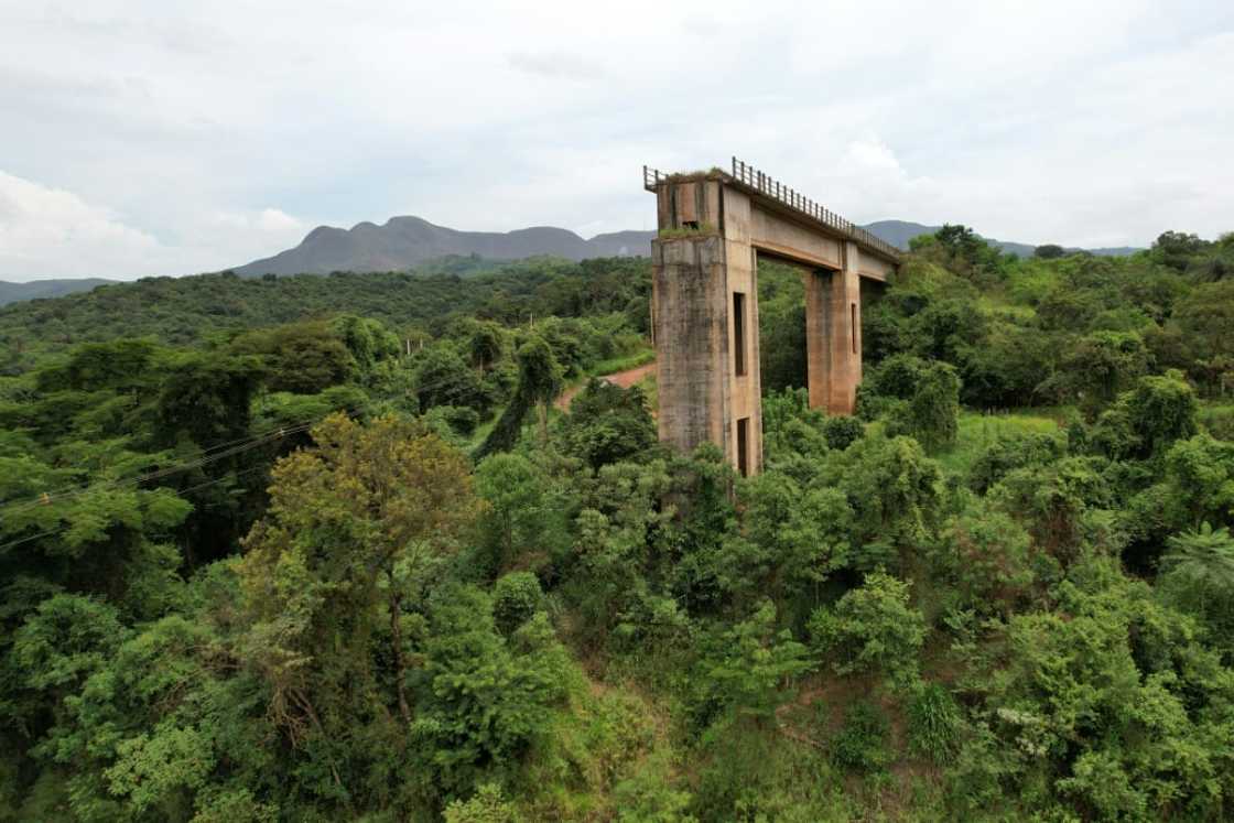 View of a railway bridge severed by the crush of mud