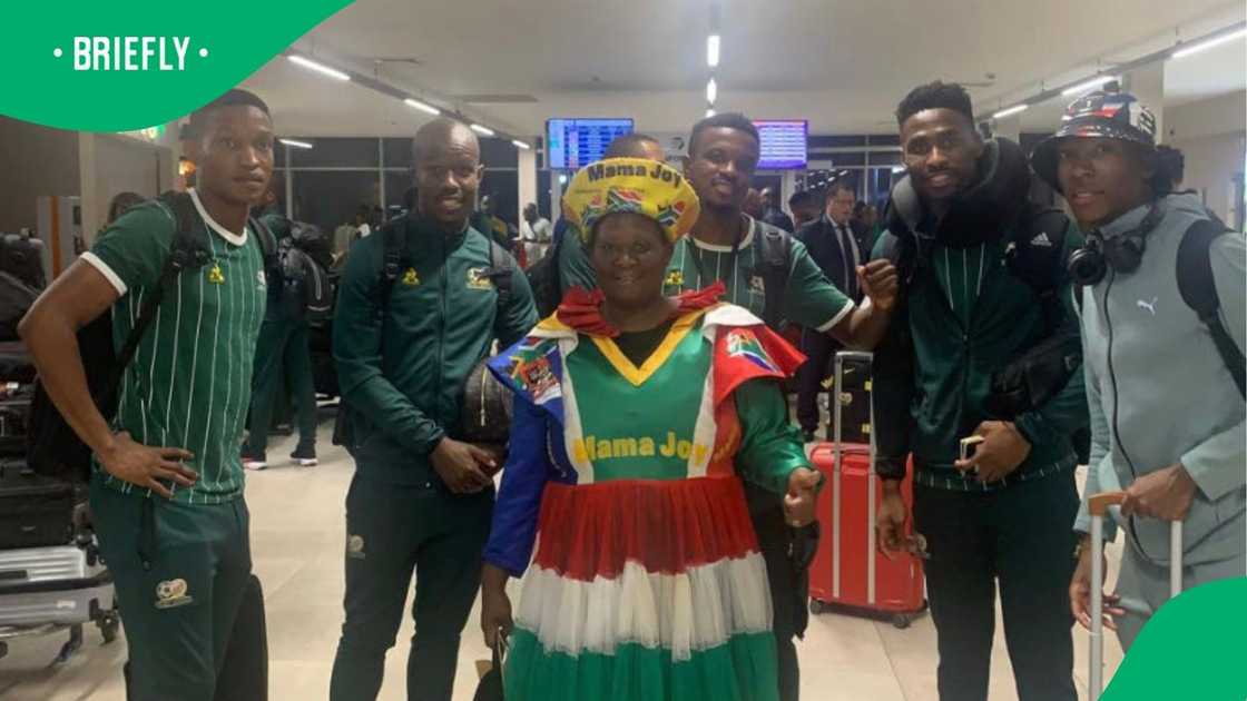 Mama Joy with Bafana Bafana stars. Mama Joy with Bafana Bafana stars.