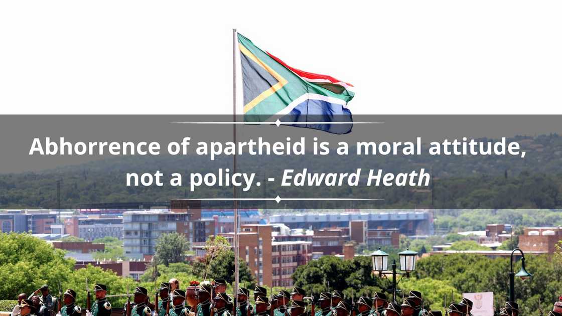 South African police officers hoisting the national flag during a parade South African police officers hoisting the national flag during a parade