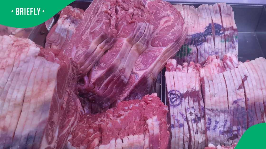 Woman finishes trolley dash by going to butchery Woman finishes trolley dash by going to butchery