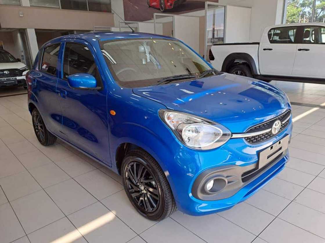 A blue Toyota Vitz A blue Toyota Vitz