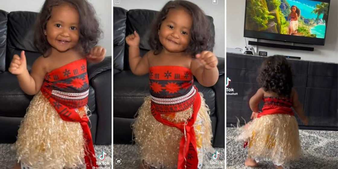 A little girl dancing like Moana