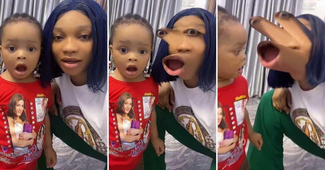 A little girl shocked by her mom's face A little girl shocked by her mom's face