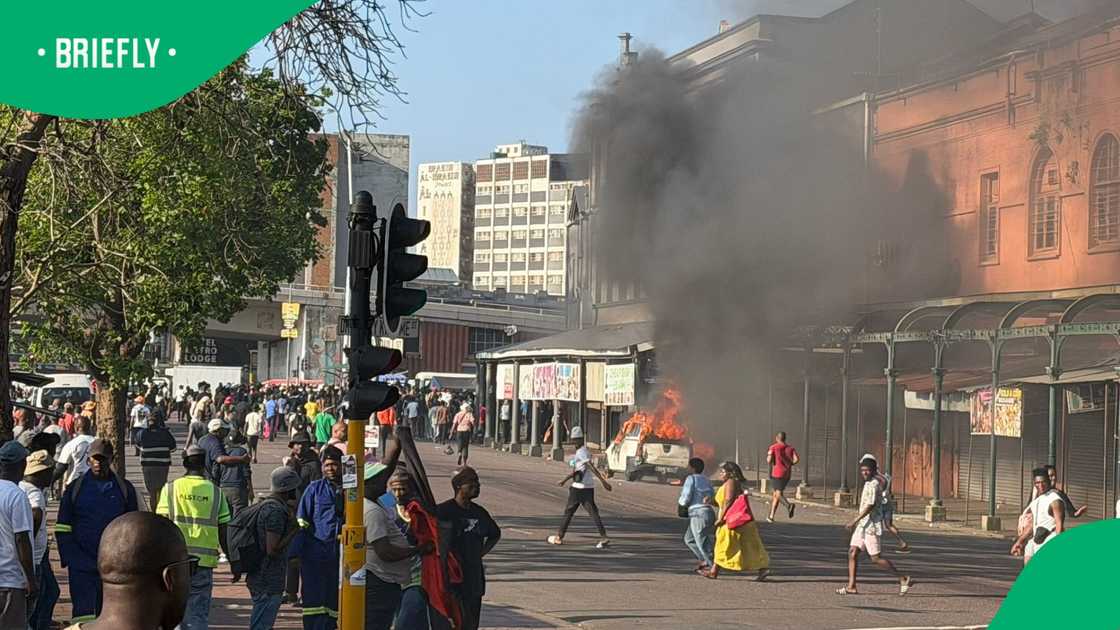 An anti-illegal immigration protest in Durban turned violent as shops and vehicles were torched