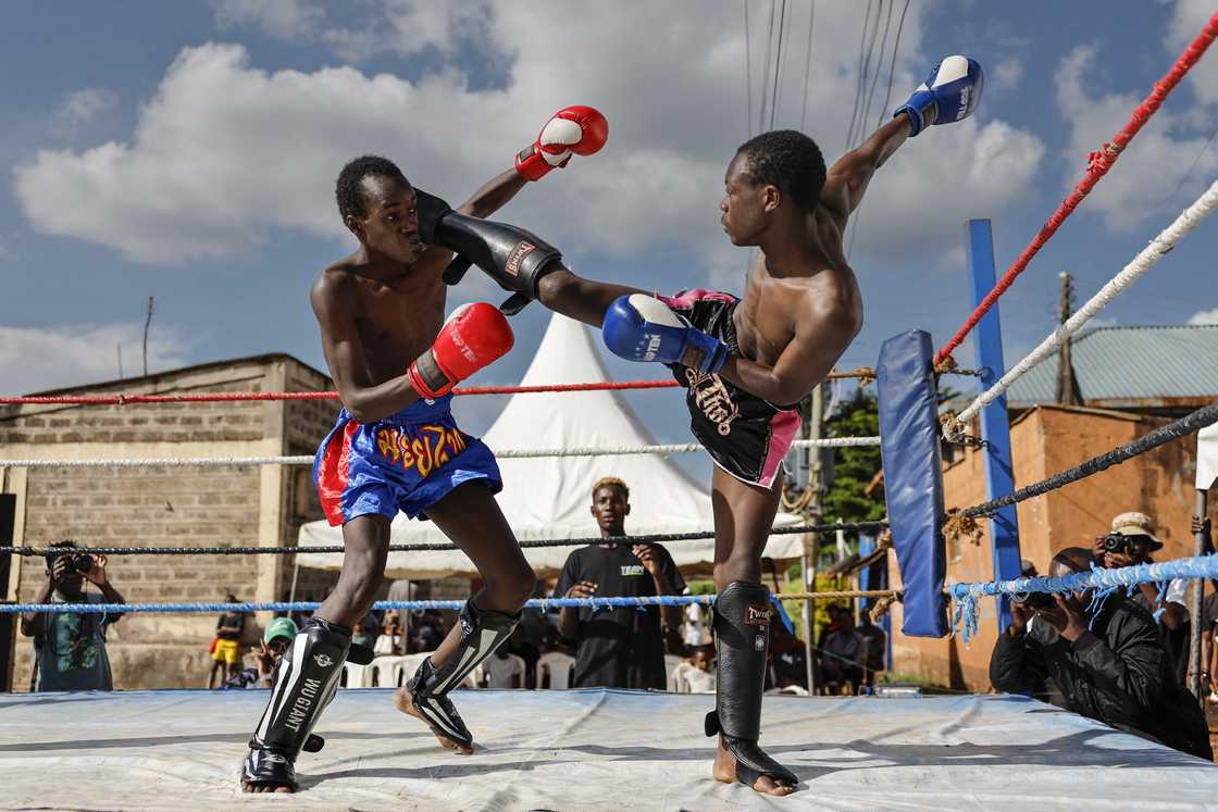 Muay Thai participants compete at the Kibera Fort Jesus grounds in Nairobi Muay Thai participants compete at the Kibera Fort Jesus grounds in Nairobi