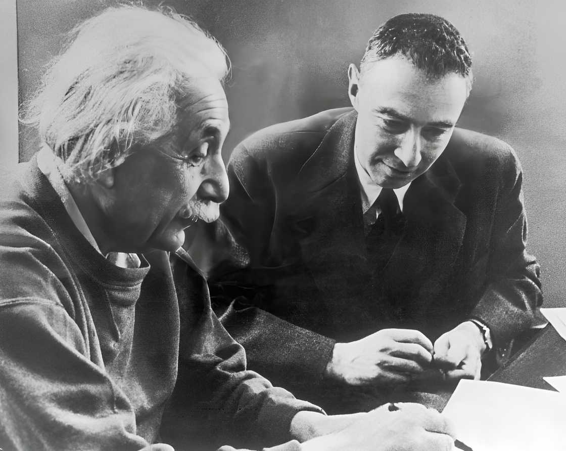 Albert Einstein telling something to Robert Oppenheimer about his attempts to explain the matter in terms of space in 1947 Albert Einstein telling something to Robert Oppenheimer about his attempts to explain the matter in terms of space in 1947