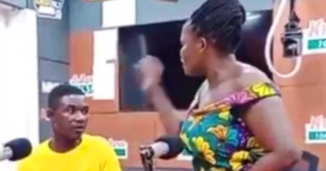 Ghanaian woman slaps husband at Nhyira FM Ghanaian woman slaps husband at Nhyira FM
