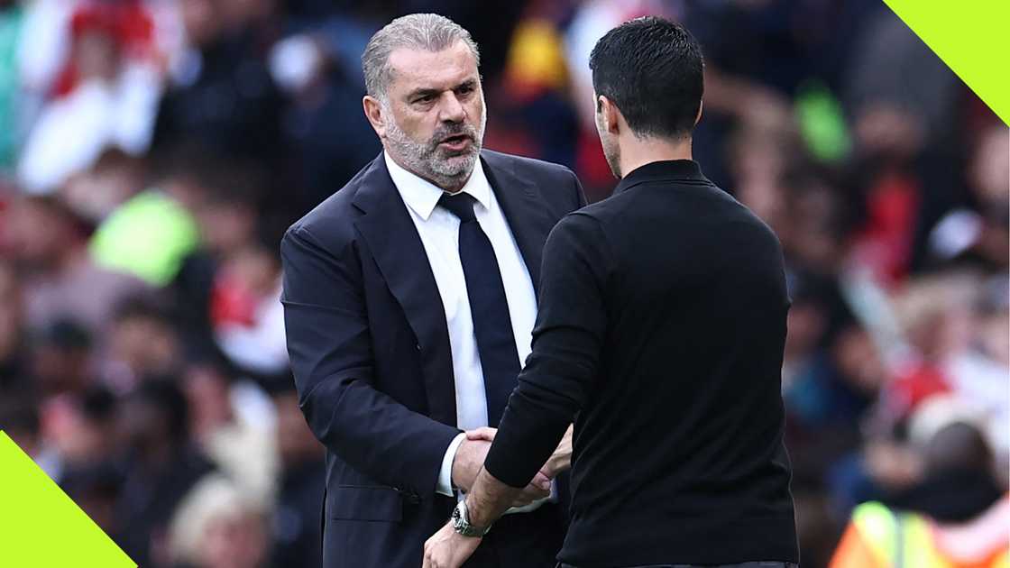 Ange Postecoglou and Mikel Arteta shake hands during the North London derby at the Emirates Stadium last season.