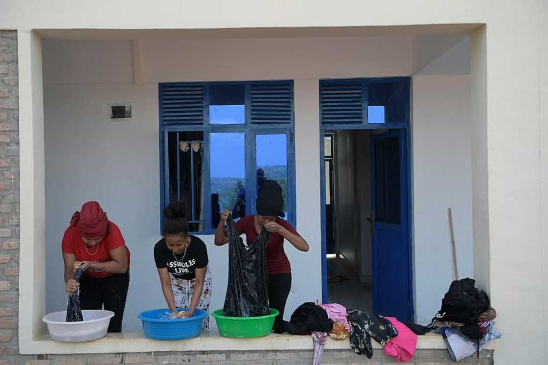 Eritrean asylum seekers wash their clothes at the Gashora camp Eritrean asylum seekers wash their clothes at the Gashora camp