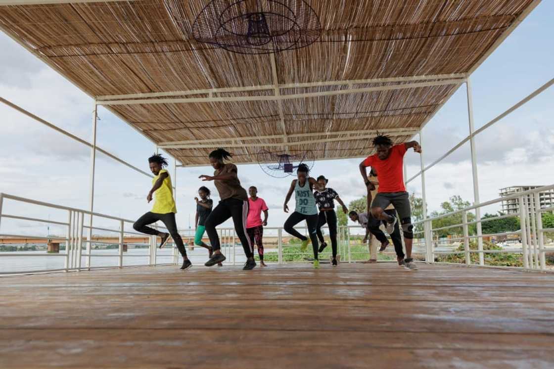 Rehearsal: Dancers from the Don Sen Folo Lab. The performers say dancing on moving water can be quite a challenge Rehearsal: Dancers from the Don Sen Folo Lab. The performers say dancing on moving water can be quite a challenge