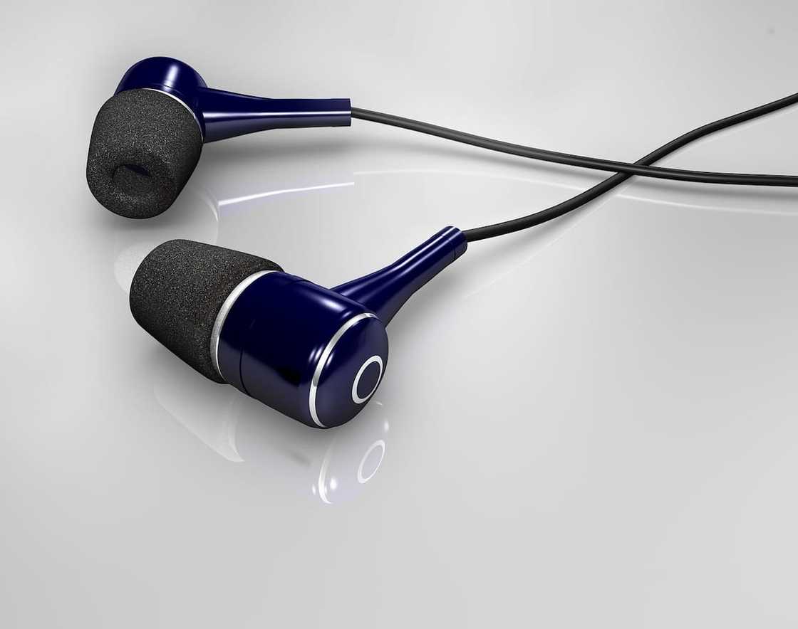 Earphones on a white surface Earphones on a white surface