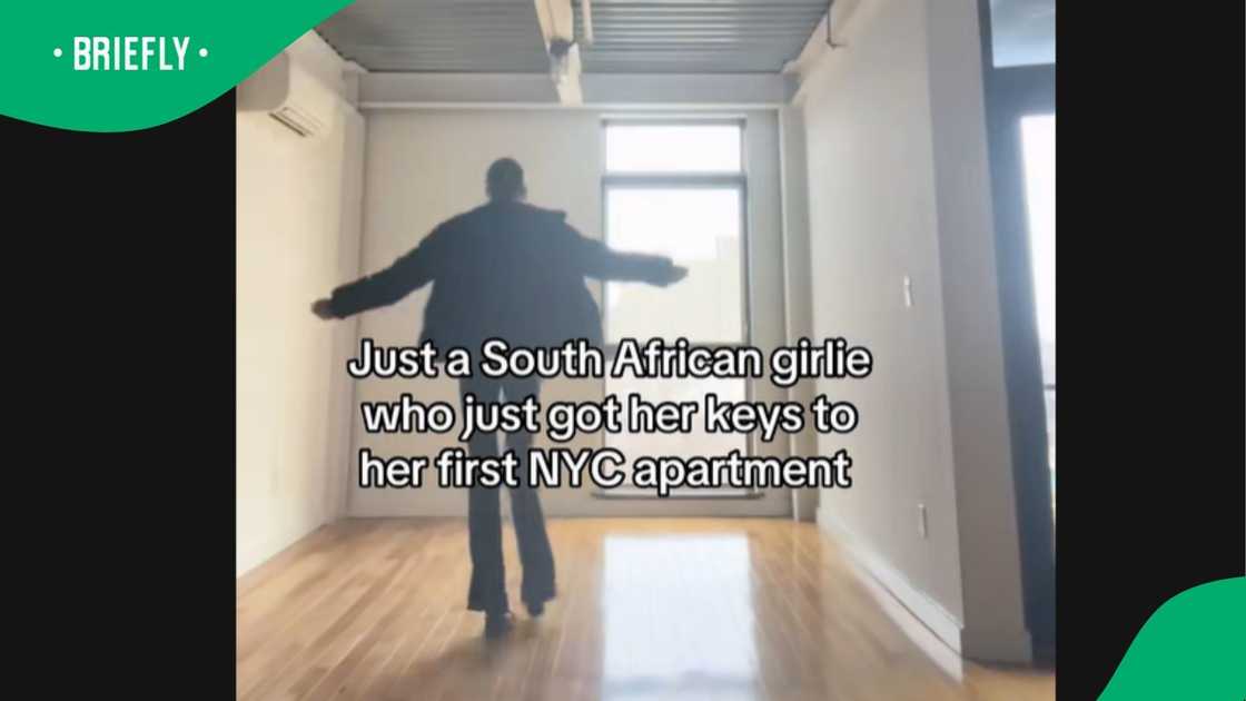 An SA woman shows off her new apartment. An SA woman shows off her new apartment.