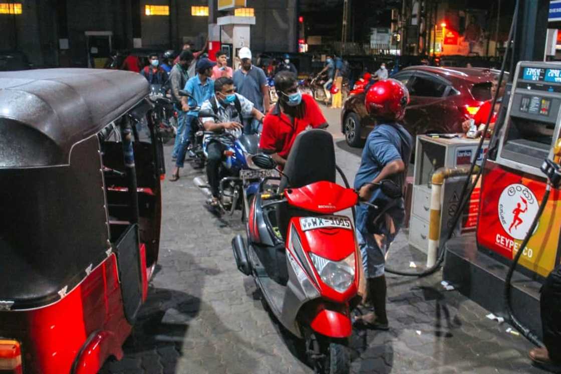 The country's fuel crisis has led to rationing orders by the government and long queues at the island's filling stations The country's fuel crisis has led to rationing orders by the government and long queues at the island's filling stations