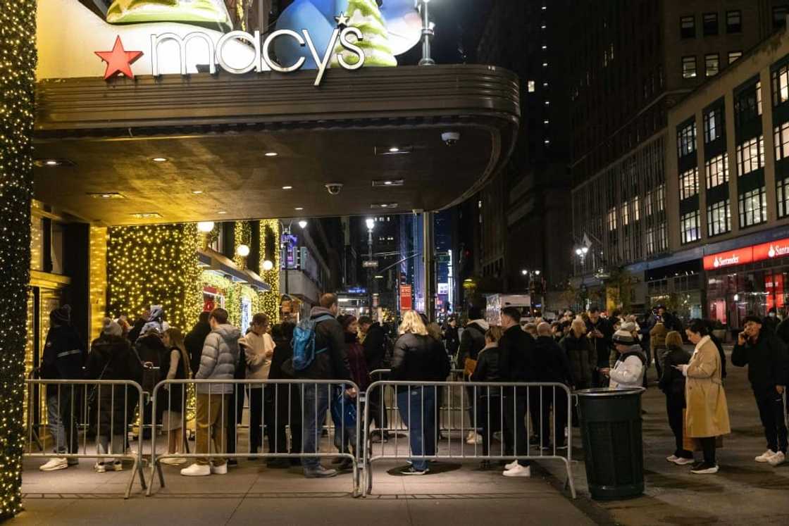 Crowds swarmed through the doors of the Macy's department store in Manhattan when it opened early on 'Black Friday'
