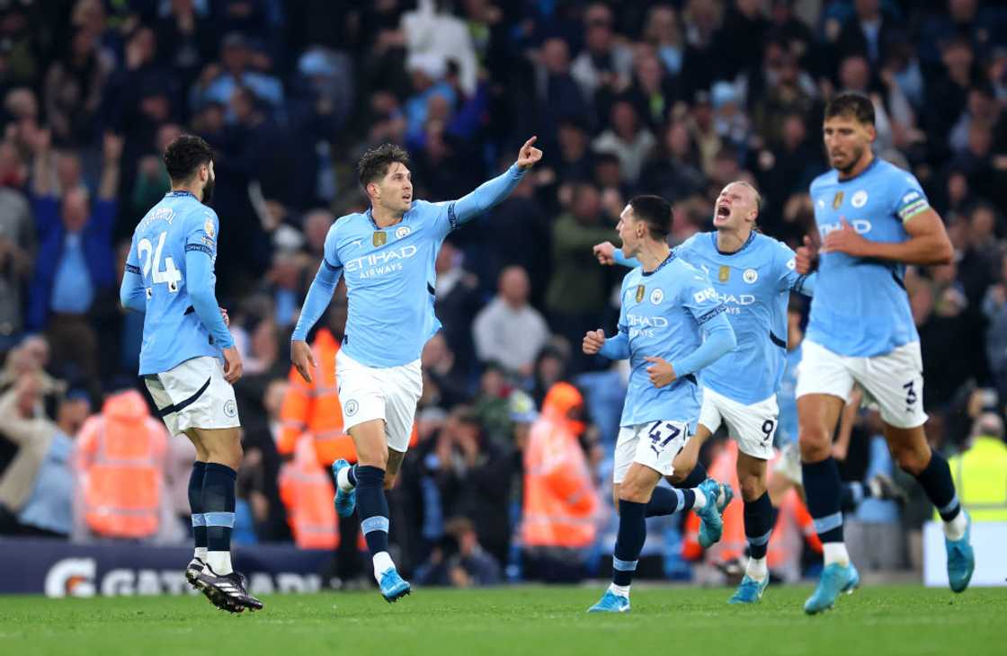 John Stones, Manchester City vs Arsenal, Leandro Trossard John Stones, Manchester City vs Arsenal, Leandro Trossard