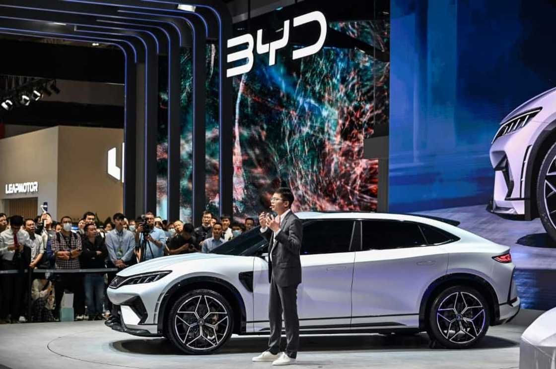 Chinese electric carmaker BYD triples half-year profit Chinese electric carmaker BYD triples half-year profit