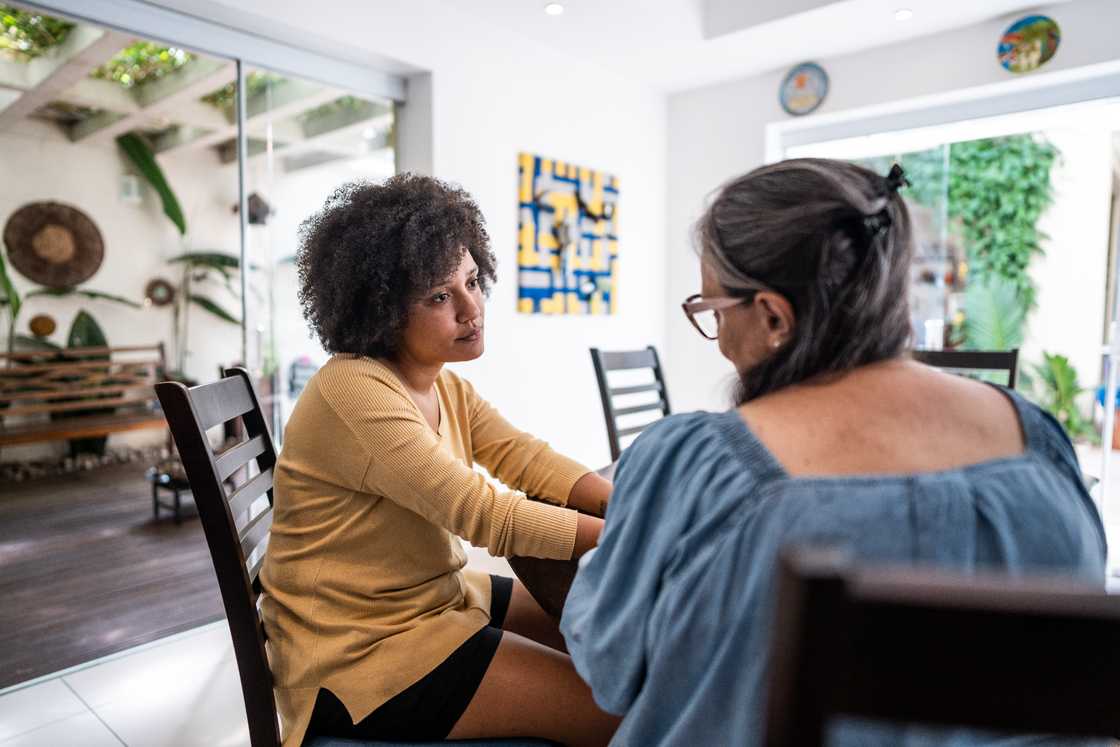 Mother and daughter talking