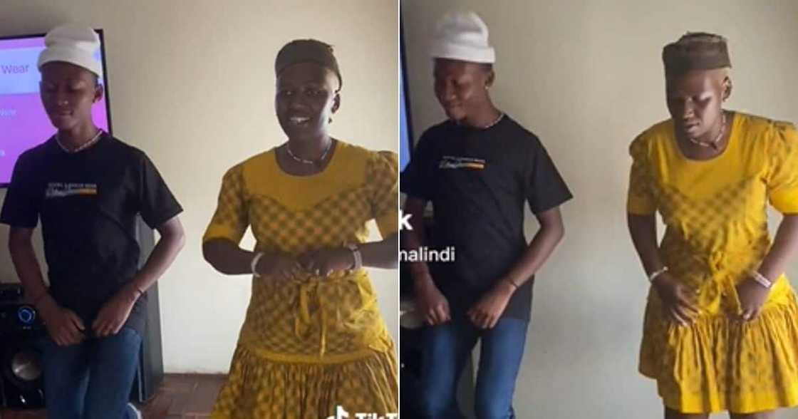 Man and woman do a traditional Sotho dance Man and woman do a traditional Sotho dance