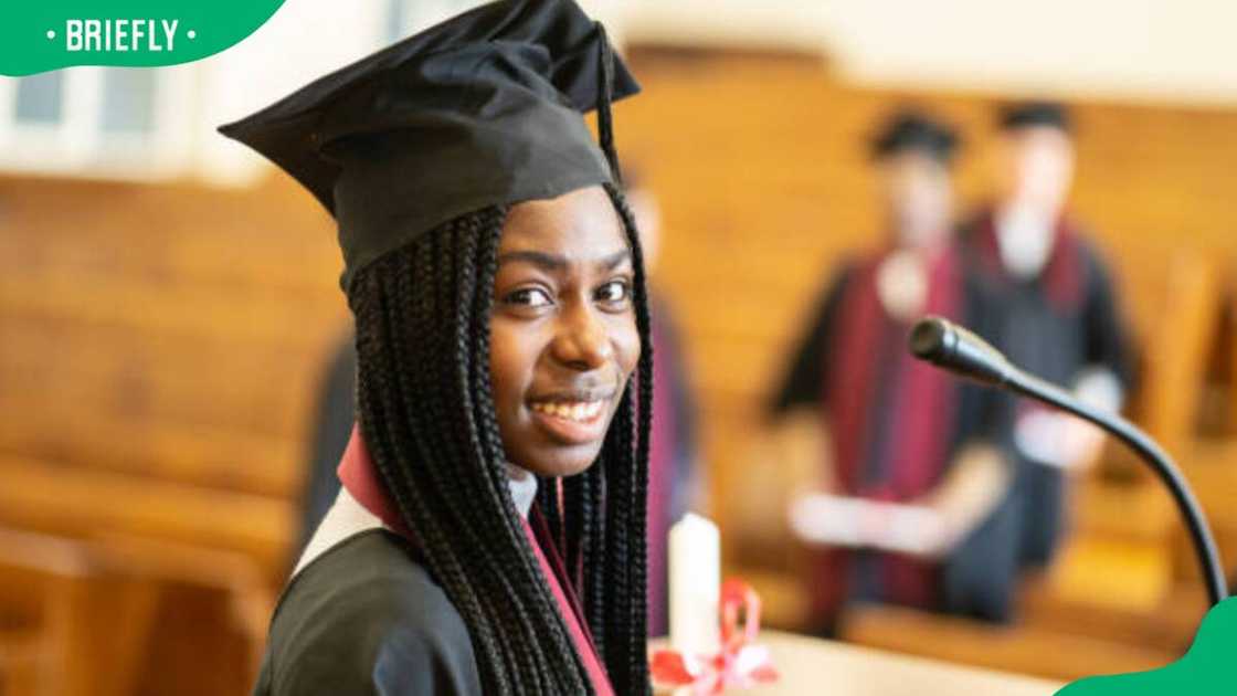 A graduate giving a speech A graduate giving a speech