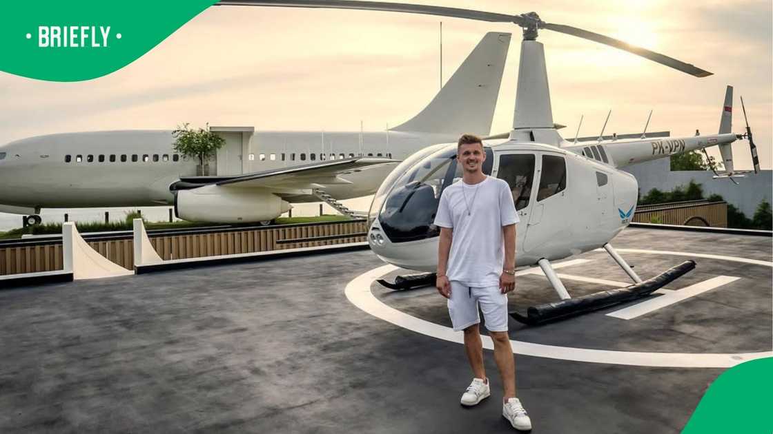 Felix Demin shows his aeroplane villa.