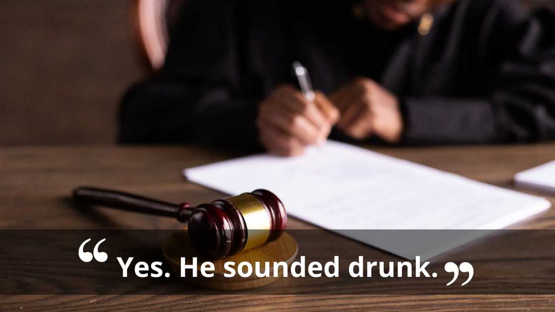 A judge writes on legal documents, slightly out of focus. A judge writes on legal documents, slightly out of focus.