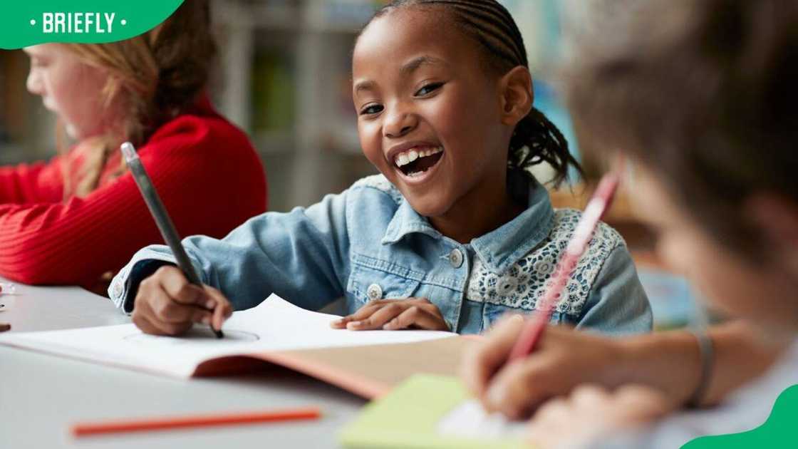 A young girl at a modern school facility