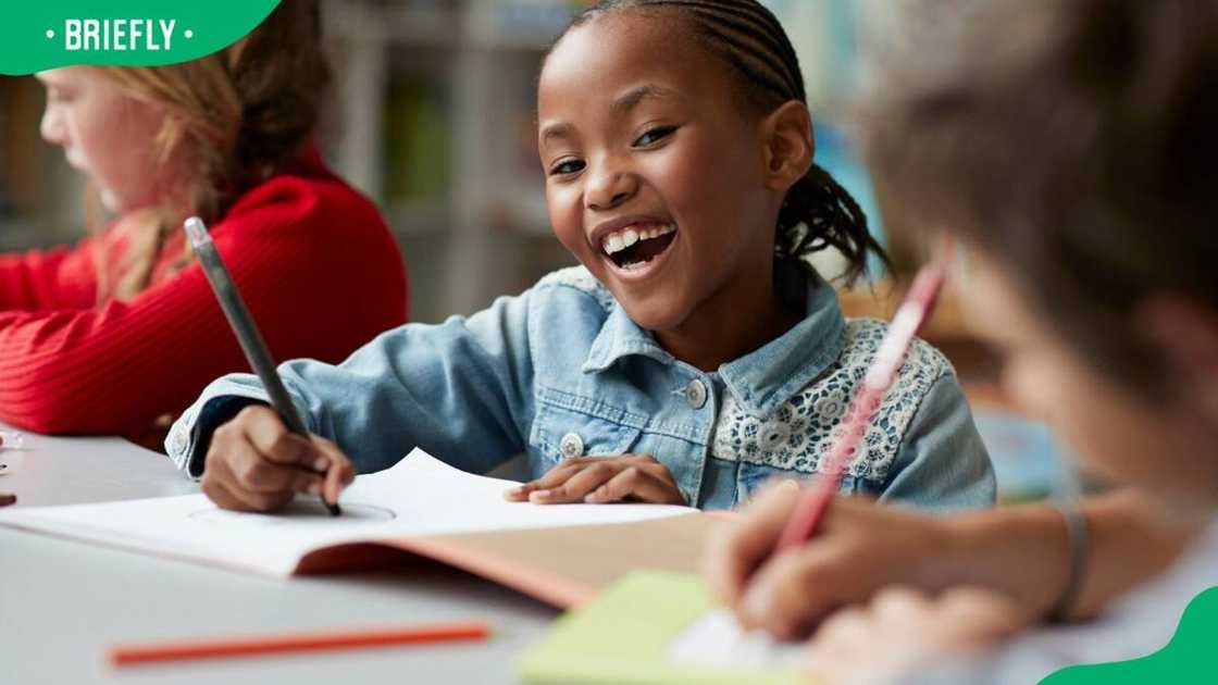 A young girl at a modern school facility A young girl at a modern school facility