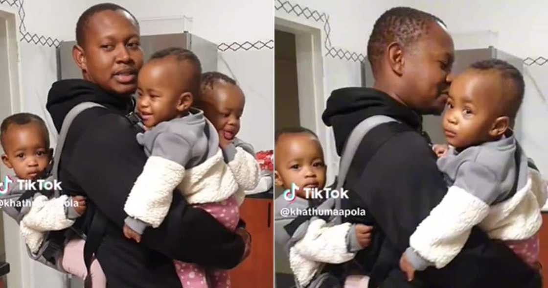 South Afrucan father of triplets takes care of kid South Afrucan father of triplets takes care of kid