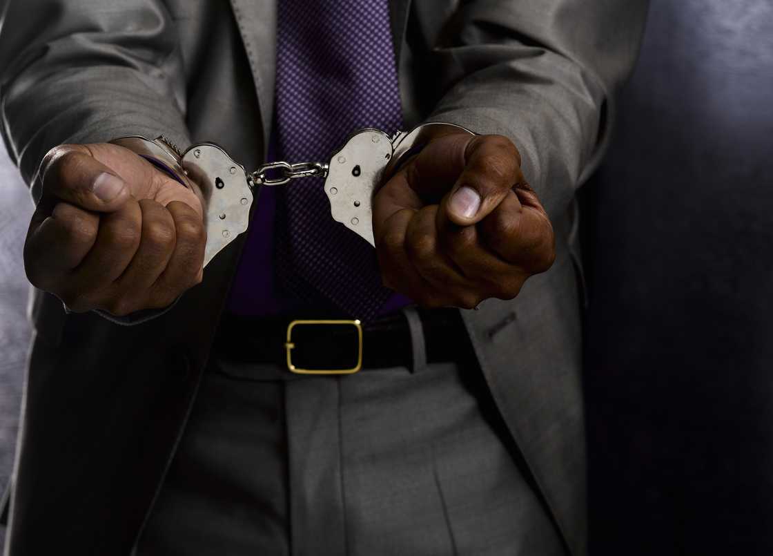 A man in handcuffs A man in handcuffs