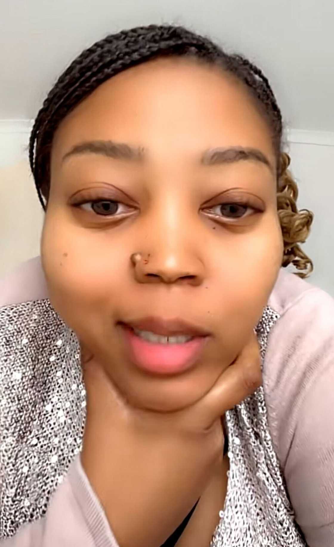 A South African woman is creating TikTok content.