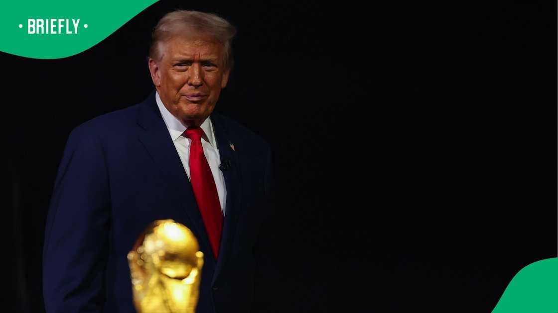 US President Donald Trump looking at the FIFA World Cup trophy US President Donald Trump looking at the FIFA World Cup trophy