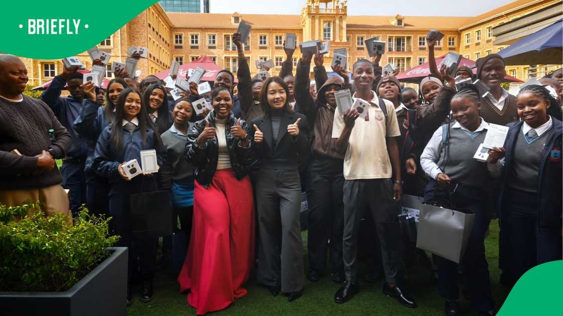 Xiaomi South Africa celebrates with 40 Gauteng learners after gifting them power banks and wireless earphones at the Community to Career Career Fair. Image: Supplied.