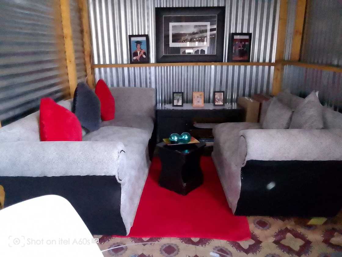 The woman showed how her living area looked like. The woman showed how her living area looked like.