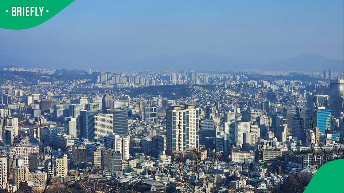 Aerial view of Seoul cityscape on a clear day.