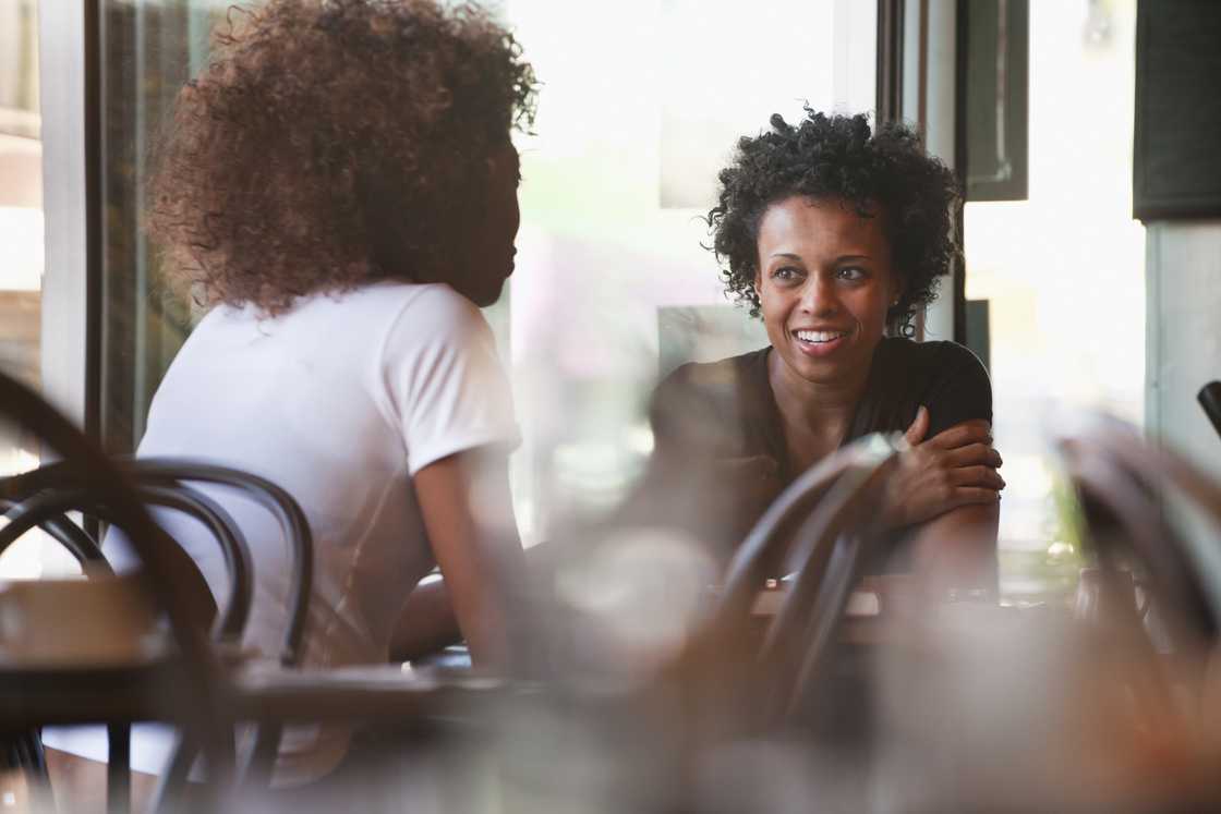 Two ladies at a cafe Two ladies at a cafe