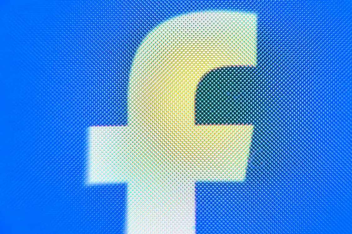 A photo taken on April 3, 2024 shows the logo of US online social media and social networking service Facebook on a smartphone screen