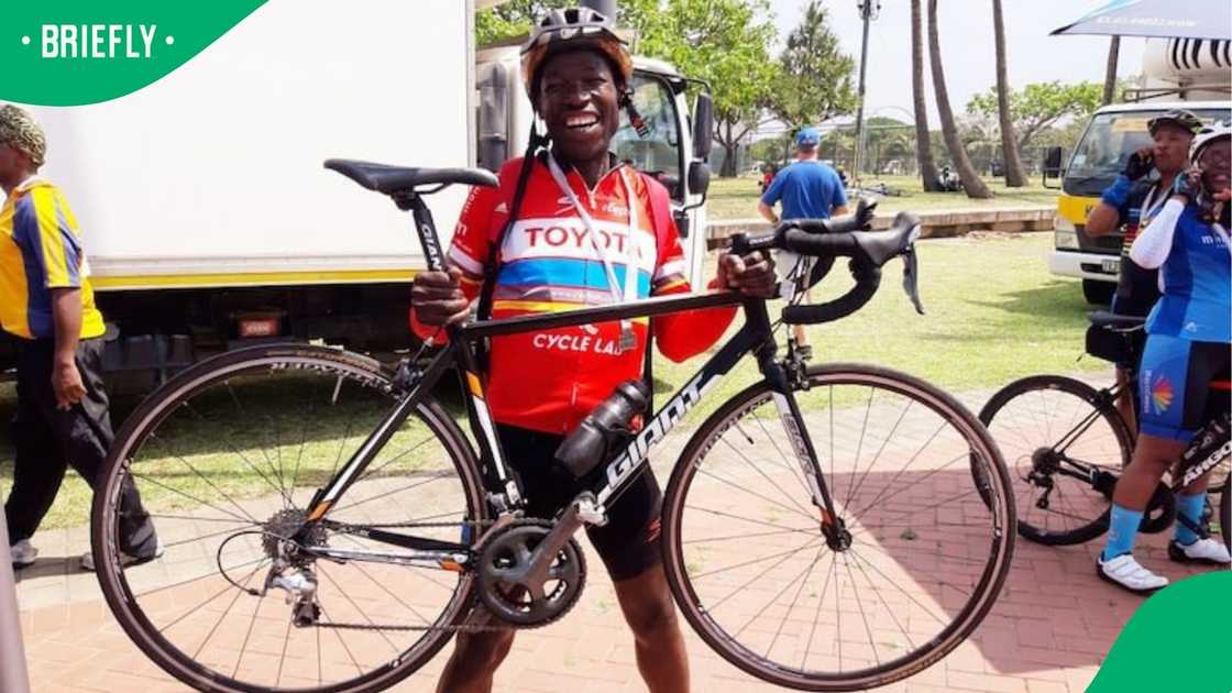 Davd Sejobe and his bicycle. Davd Sejobe and his bicycle.