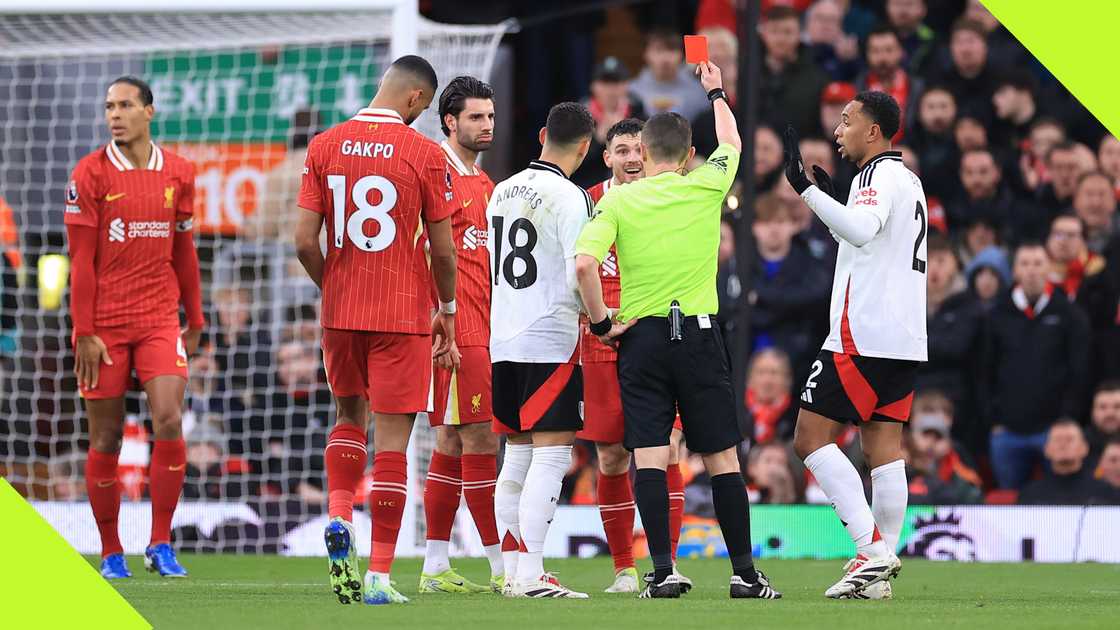 Liverpool's Andy Robertson was shown a straight red card after fouling Fulham's Harry Wilson Liverpool's Andy Robertson was shown a straight red card after fouling Fulham's Harry Wilson