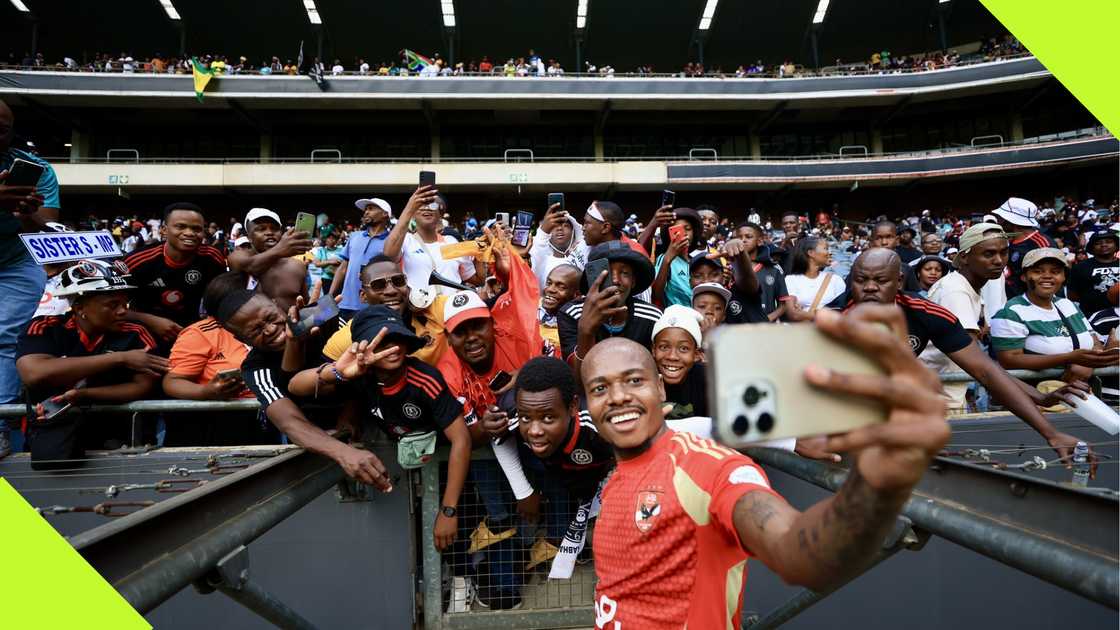 Percy Tau celebrated by Orlando Pirates fans on his return to South Africa.