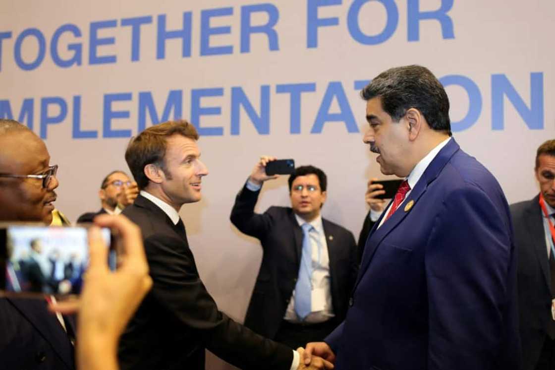 The handshake and chat on the sidelines of the summit in Sharm el-Sheikh were a stark contrast to previous comments by Macron