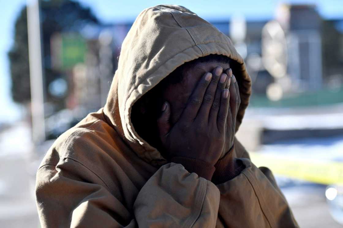 Joshua Thurman reacts the morning after he witnessed a mass shooting November 19, 2022 at an LGBTQ nightclub in Colorado Springs, Colorado that claimed five lives