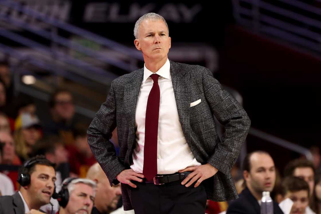 Andy Enfield of the USC Trojans looks on during the first half against the Arizona Wildcats Andy Enfield of the USC Trojans looks on during the first half against the Arizona Wildcats