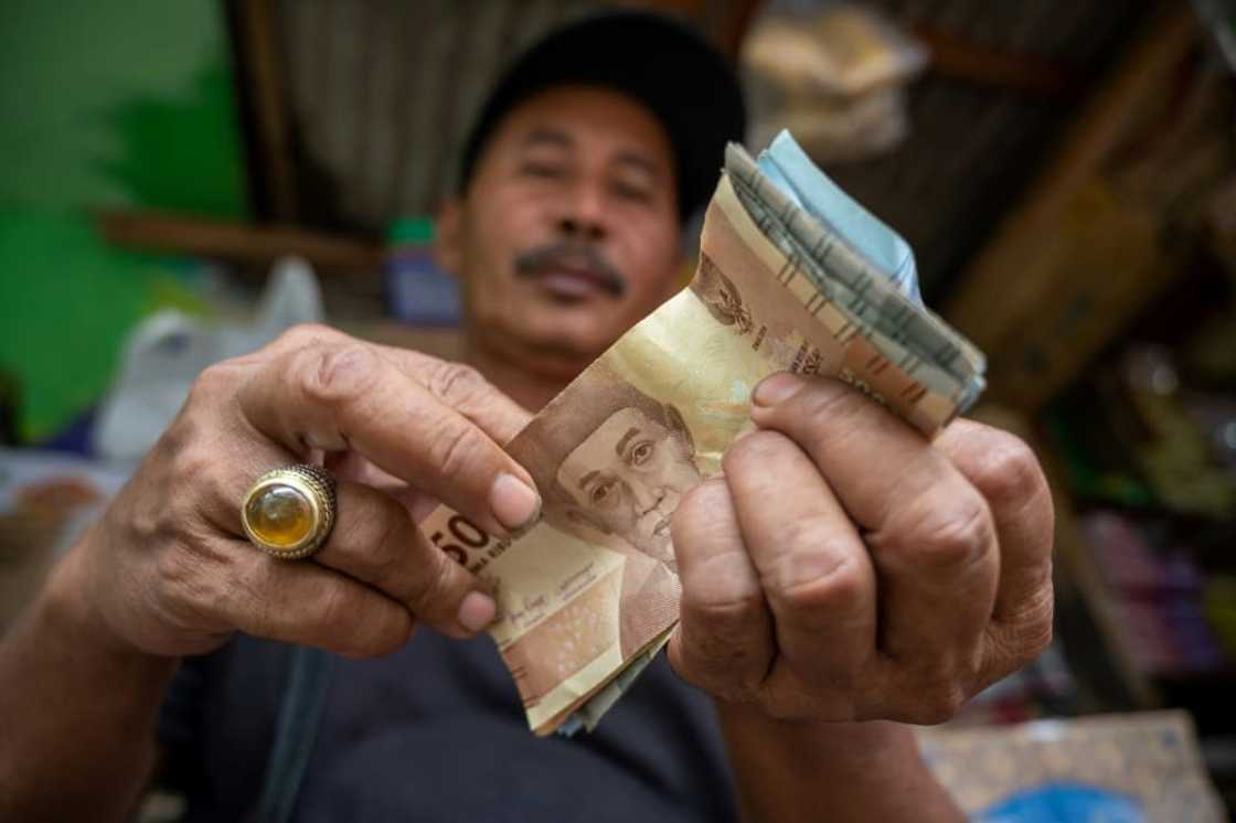 Indonesia's central bank hiked its key interest rate for the second straight month Indonesia's central bank hiked its key interest rate for the second straight month
