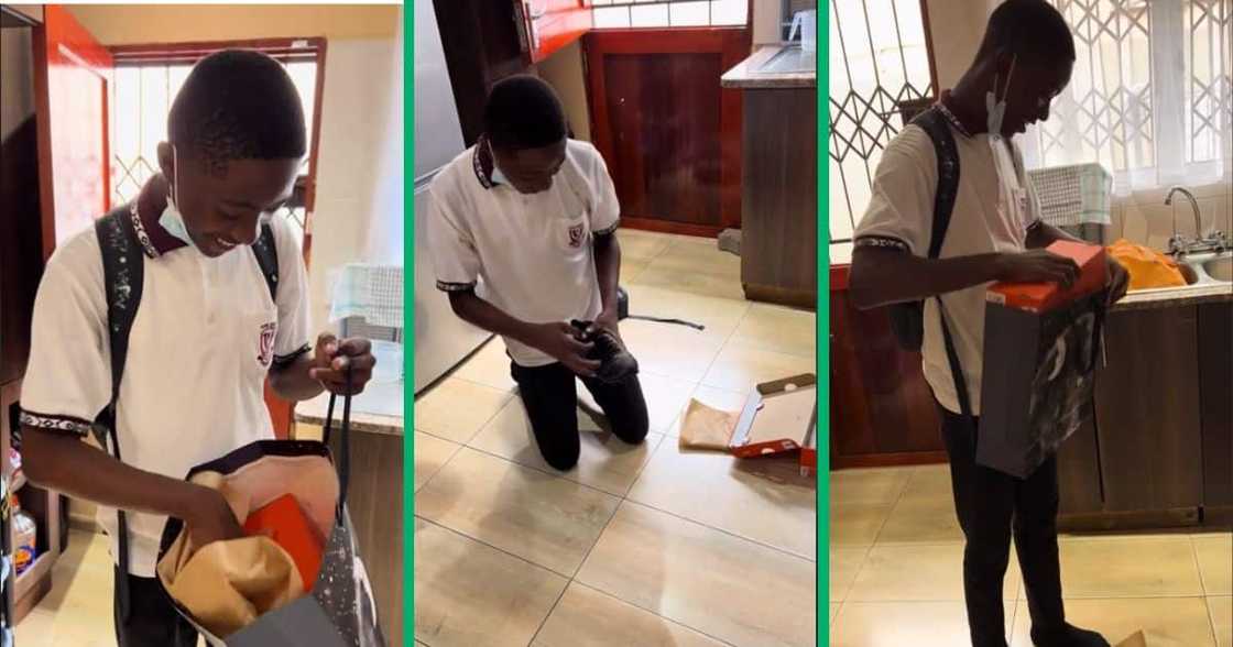 Boy receives new soccer boots Boy receives new soccer boots