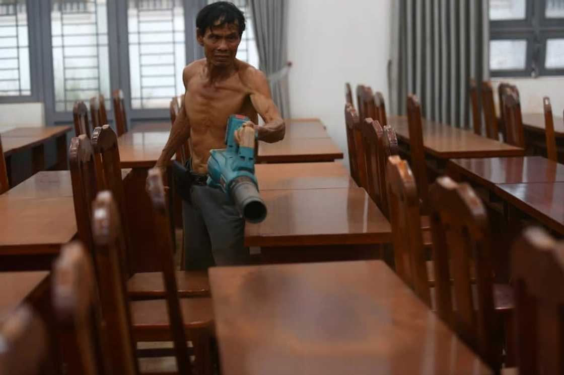 The dust even finds its way into the classrooms of a local primary school The dust even finds its way into the classrooms of a local primary school