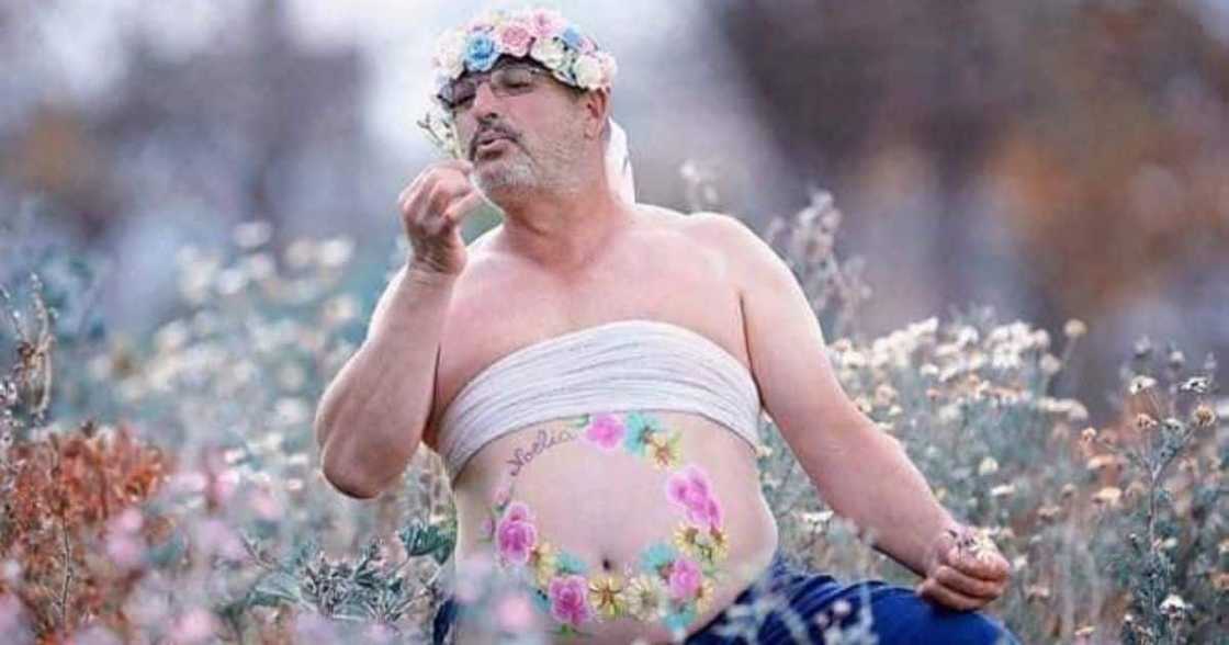 Dad goes for maternity shoot after his wife refused Dad goes for maternity shoot after his wife refused